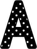 Free printable black with a white polka dot background classroom display lettering sets for bulletin board display.