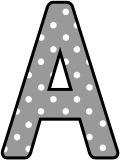 Free printable grey with a white polka dot background classroom display lettering sets for bulletin board display.