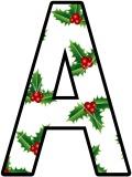 Christmas themed lettering sets for classroom display, with a Holly background.