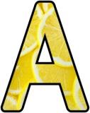 Printable Classroom Display Lettering with a Lemon Slices background.  Fruit and Veg alphabet sets.